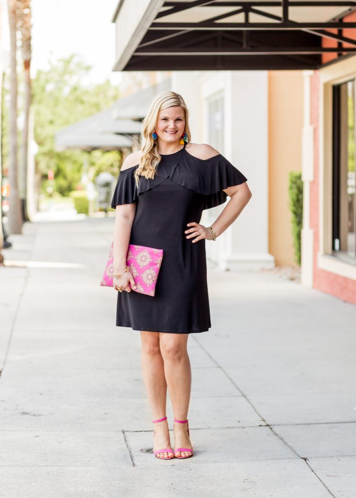 Black Dress and Pink Shoes Outfit featured by top Orlando fashion blog, Fabulously Overdressed: image of a woman wearing a Ross off the shoulder black dress and pink shoes.