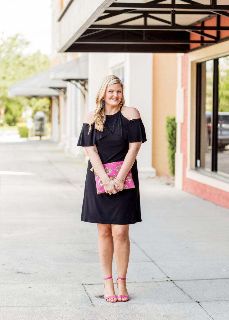 Black Dress and Pink Shoes Outfit featured by top Orlando fashion blog, Fabulously Overdressed: image of a woman wearing a Ross off the shoulder black dress and pink shoes.