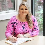 How to Make Life Easier: 12 Top Tips featured by top US lifestyle blog, Fabulously Overdressed: image of a woman writing in an Erin Condren planner.